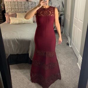 Formal burgundy bandage dress.